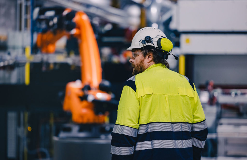 Torgeir, a Nel engineer from behind in a factory